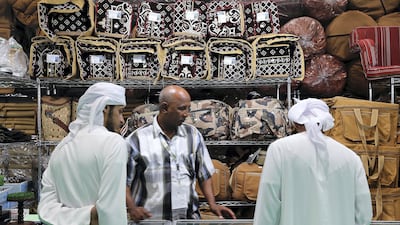 Visitors shop for items on display at Adihex on Tuesday. Pawan Singh / The National