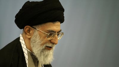 (FILES) Iran's supreme leader Ayatollah Ali Khamenei votes at Imam Khomeini mosque on February 20, 2004 in Tehran. Witnesses said on February 28, 2026, that loud cheers echoed across parts of Tehran and residents took to their windows to applaud and play celebratory music after reports of Iranian supreme leader Ayatollah Ali Khamenei's death. (Photo by Behrouz MEHRI / AFP)