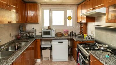 The kitchen area in the apartment in the Oud Metha district
