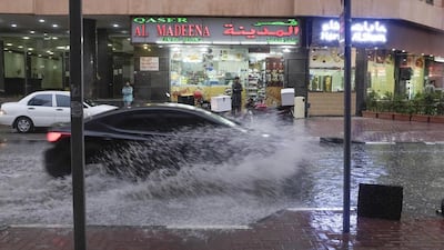 A flooded street in Dubai last month where strong wind caused a crane to collapse. Antonie Robertson /The National