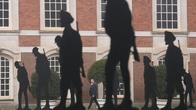An installation titled 'Standing With Giants', depicting more than 100 life-sized British and Indian soldiers at Hampton Court Palace, London in 2021. Reuters