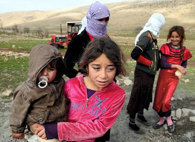 Yezidis like these were forced to flee their villages Getty