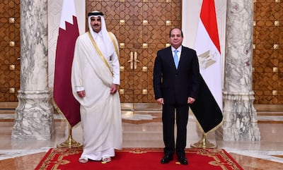Qatari Emir Sheikh Tamim meeting Abdel Fattah El Sisi in Cairo in June. Mr El Sisi is currently being received in Doha by the emir. Photo: Egyptian Presidency / AFP