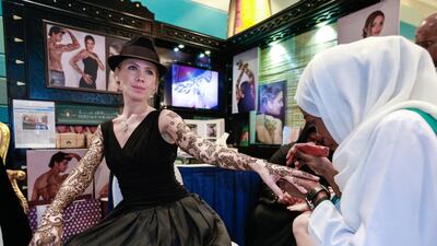 A Heritage for Henna model shows off her Henna art in Dubai. Victor Besa for The National.