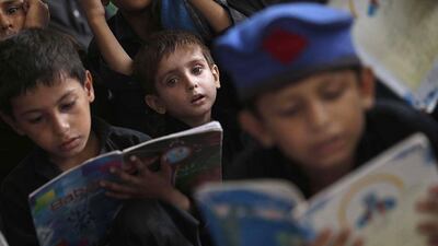 Pakistani boys attend school on the eve of International Literacy Day in Peshawar, Pakistan. Bilawal Arbab / EPA