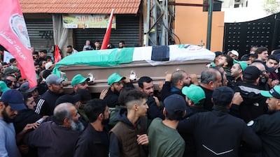 Mourners gather during the funeral of Ahmad Hammoud, who was killed with Hamas deputy leader Saleh Al Arouri in an Israeli drone strike in Beirut. Reuters