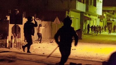 Riot police clash with demonstrators during anti-government protests in Tebourba. Amine Landoulsi / AP Photo