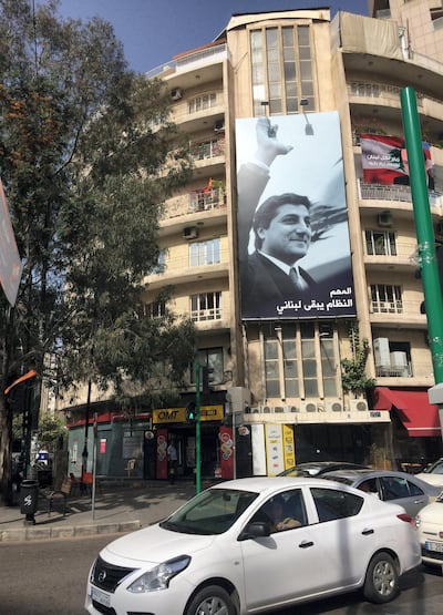 A huge banner shows Lebanon’s late president elect Bachir Gemayel, father of Nadim Gemayel, in Beirut’s Sassine Square. He was assassinated in September 1982. Arthur MacMillan / The National