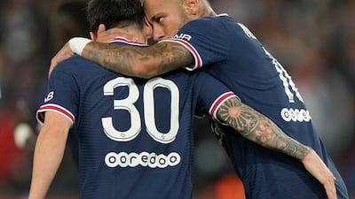 PSG's Neymar, right, celebrates with Lionel Messi after scoring his side's first goal. AP Photo
