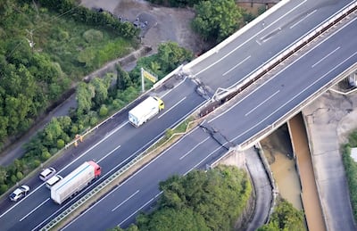 The Kyushu motorway was damaged in both directions. Kyodo / via Reuters