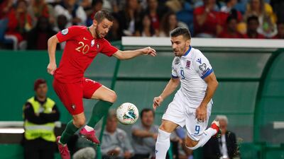 Portugal's Bernardo Silva, left, challenges for the ball with Luxembourg's Daniel Da Mota during the Euro 2020 group B qualifying soccer match between Portugal and Luxembourg at the Jose Alvalade stadium in Lisbon. AP Photo