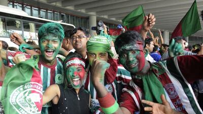 Fans of Mohun Bagan shown celebrating in the wake of hte team's I-League title last June. Subhendu Ghosh / Hindustan Times / Getty Images/ June 1, 2015