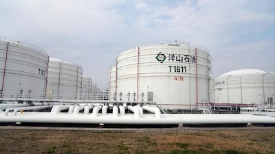 Oil tanks are seen at an oil warehouse at Yangshan port in Shanghai. The world’s second largest economy imports most of its oil from the Middle East, Russia and West Africa. Reuters