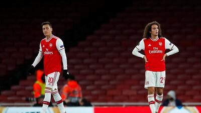 Mesut Ozil looking unhappy after Eintracht Frankfurt's Daichi Kamada scores their second goal. Reuters