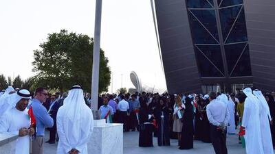 Aldar Properties raises the flag in Abu Dhabi. Courtesy Aldar.