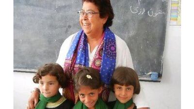 Afghan schoolgirls' faces speak eloquently of what the country needs, a reader says. Courtesy: Ray of Hope Foundation