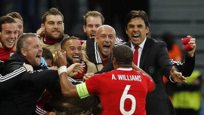 Wales' Ashley Williams celebrates scoring against Belgium in their Euro 2016 quarter-final victory. Pascal Rossignol / Reuters / July 1, 2016