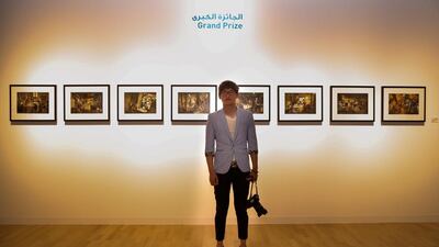 Chengliang Liu won the grand prize at Emirates Photography Competition, with his winning photos, Love on the cooking bench. Courtesy: TCA Abu Dhabi