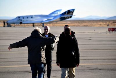 Sir Richard Branson and George Whitesides congratulate Chief Pilot Dave Mackay and Test Pilot Mark Stucky after a successful first glide flight of Virgin Spaceship Unity (VSS Unity) in Mojave Desert on 3rd December 2016. Courtesy Virgin Galactic
