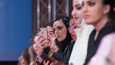 Capturing the moment. Photo: Leslie Pableo for The National