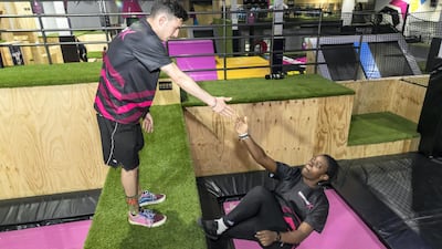 Members of the Bounce X staff show off their skills ahead of the public opening. Antonie Robertson / The National