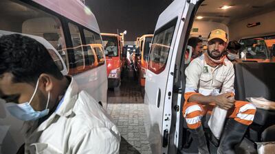 Sharjah municipal staff prepare to disinfect the streets of the emirate. Antonie Robertson / The National