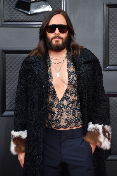 Jared Leto arrives for the 64th Annual Grammy Awards wearing a Gucci look. AFP
