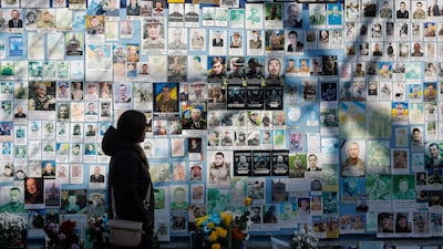 A memorial wall dedicated to fallen defenders of Ukraine in central Kyiv in 2024. EPA