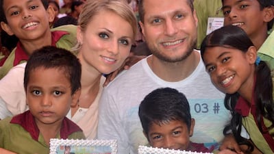 Eva Kernova and Mohammed Loch with some of the Bangladesh children at the school they have set up. Courtesy Eva Kernova