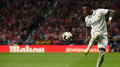 Real Madrid forward Vinicius Junior controls the ball during game against Atletico Madrid. AFP