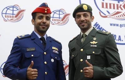 The UAE's first astronaut Hazza Al Mansouri with fellow Emirati Sultan Al Neyadi, who is part of the back-up crew for the International Space Station mission. EPA