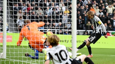 Nick Woltemade, right, opens the scoring for Newcastle against Chelsea. EPA