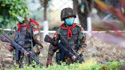Myanmar's soldiers walk near the congressional compound in Naypyitaw, Myanmar, February 2, 2021. REUTERS