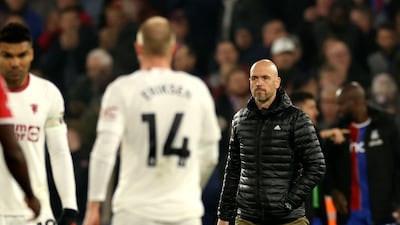 Manchester United manager Erik ten Hag walks on the pitch at the end of the defeat to Crystal Palace. AP