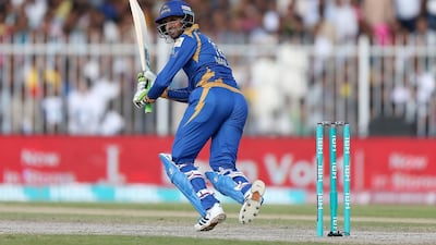 Shoaib Malik of Karachi Kings playing a shot against Lahore Qalandars in the Pakistan Super League T20 match at Sharjah Cricket Stadium in Sharjah. ( Pawan Singh / The National )