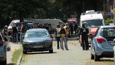 Police and rescuers work at the scene where several people were killed in a shooting in Stade, northern Germany. AFP
