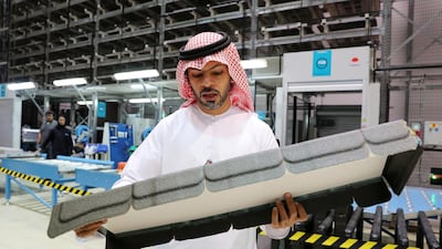 Ismail Ali Mohammed Abdulla, Chief Executive Officer, explaining the manufacturing of parts for Airbus and Boeing at the Strata Manufacturing facility in Al Ain. Pawan Singh/The National