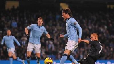 David Silva either side of half time for Manchester City against Fulham. Michael Regan / Getty Images