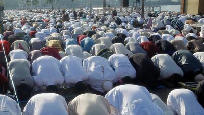 Filipinos pray during an Eid Al Adha prayer service in Zamboanga city, southern Philippines. EPA