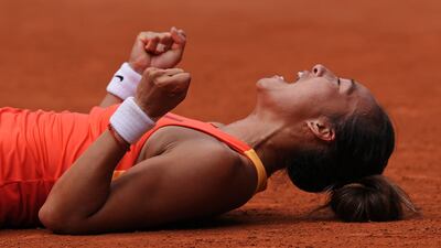 China's Zheng Qinwen reacts after beating Poland's Iga Swiatek to reach the final. AFP