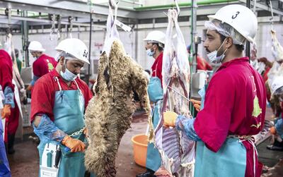 More than 100 butchers work at the facility in Mina Zayed. Victor Besa / The National