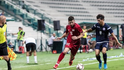 Action from Syria v Guam at Al Maktoum bin Rashid Stadium. Antonie Robertson/The National