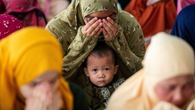 Women attend Eid Al Adha prayers at a mosque in Marikina City, Philippines. Reuters