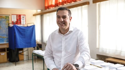 Mr Tsipras casts his ballot at a polling station in Athens. Bloomberg