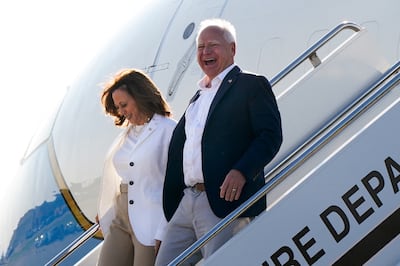 US Vice President and Democratic presidential candidate Kamala Harris and Minnesota Governor Tim Walz in Romulus, Michigan. Reuters