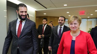 Syria's President Ahmad Al Shara, left, and Foreign Minister Asaad Al Shibani with IMF chief Kristalina Georgieva in Washington on November 9, 2025. AFP