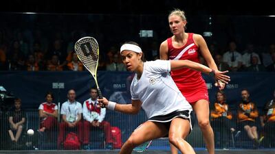Nicol David of Malaysia plays a shot against Laura Massaro of England. Alex Livesey/Getty Images