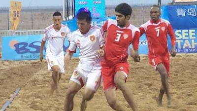 The host Chinese National Team claimed the Asian Beach Soccer Cup after edging the UAE, in red, in the penalty kick shoot out.