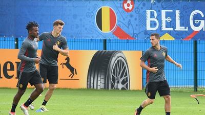 Belgium forward Eden Hazard (R), Thomas Meunier (C) and Michy Batshuayi (L) take part in a training session during the Euro 2016 football tournament at Le Haillan on June 30, 2016. Nicolas Tulat / AFP