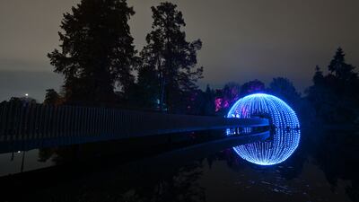 Lights illuminate the Sackler Crossing at Kew Gardens. AFP